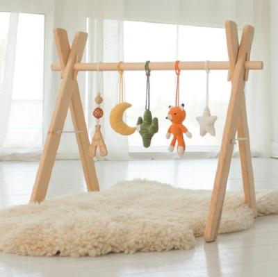 China XIHA Eco-Friendly Foldable Baby Gym Frame Activity Play Fitness Gym with 3 Wooden Baby Teething Toys Montessori Hanging Baby Activity Gym for sale