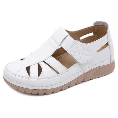 China Hot Selling Retro Genuine Leather Round Hollow Out Elegant Soft Sole Sandals Women Shoes for sale