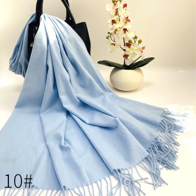 China Good Quality Solid Color Polyester Fabric Scarves Daily Life Refine Head Scarf Women Hijab With Tassel for sale