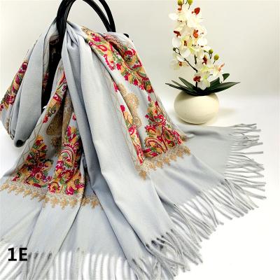 China Simulate cashmere wholesale winter embroidery polyester cheap cashmere scarf shawls with tassel for sale