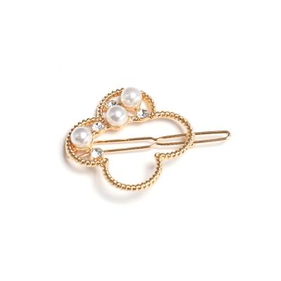 China Latest fashion design metal rhinestone and gold plated pearl flower hairpin wholesale for sale