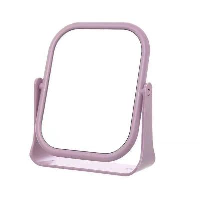 China Minimalist Portable Double Sided Rotating Make Up Mirror Bathroom Cosmetic Mirror Rotating Tabletop Circular Cosmetic Mirror for sale