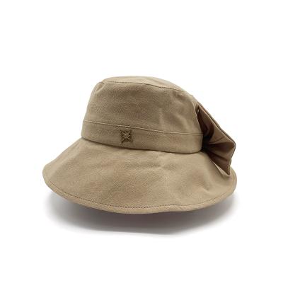 China Fashion JOINT Custom Logo Winter Hat Brown Bow Hat Six Colors Can Be Customized Portable Sun Visor for sale