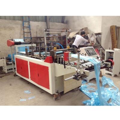 China Apron Bag Making Machine Automatic Plastic Pe Apron Making Machine By Roll Or Sheet for sale