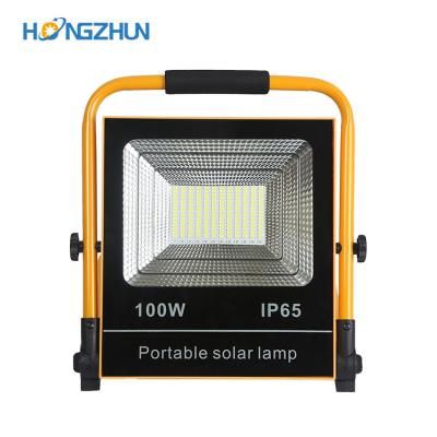 China Emergency ip66 waterproof outdoor portable rechargeable 50w 100w garden all in one solar led flood light for sale