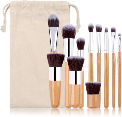 China Angular Blush Makeup Tools 11 PCS Nylon Hair Bamboo Handle Makeup Set Brush With Pouch for sale