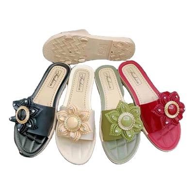 China Fashion trend newcomer designs lovely servo drive flower summer ladies shoes durable slippers for sale