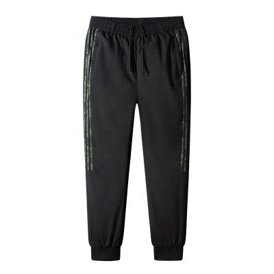 China Unique Winter Waterproof Pants Men Outwear Breathable Waterproof Male Sports Velvet Sweatwear Down Pants for sale