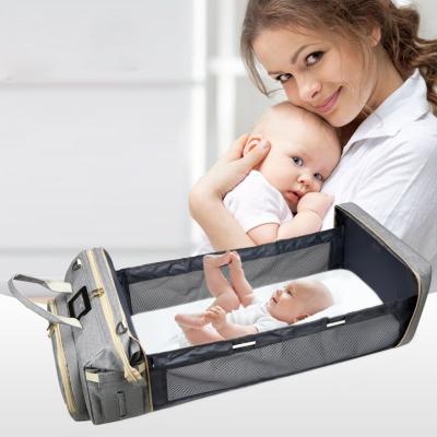 China With USB Wholesale Custom Deluxe Foldable Baby Crib Diaper Bag Ride 3 in 1 Diaper Bag with Changing Station for sale