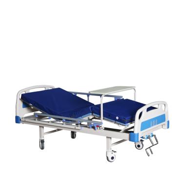 China SFD-B2101D 2 metal cranks hospital bed with dining table medical bed for patient for sale