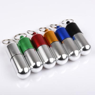 China Lightweight Metal Aluminum Alloy Pills Container Waterproof Pill Box Key Chain Pill Holder for sale