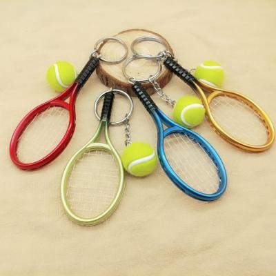 China Funny Metal Souvenir Things Going Away Scrambled Gifts Tennis Racket Keychain Tennis Ball Keychains for sale