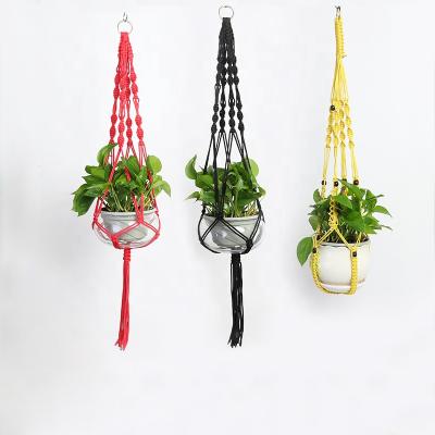 China Bohemian Style Durable And Functional Macrame Plant Hanger Nylon Rope Plant Holders For Hanging Plant for sale