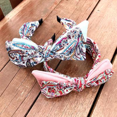 China Latest fashion new style high quality stylish design printing fabric big bow wide headband for women for sale