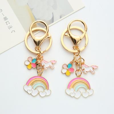 China New Creative Cute Alloy Key Chain Rainbow Cloud Metal Key Chain Zinc Alloy Drip Bag Accessories for sale