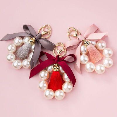 China Hot Pearl And Tassel Fashion Bowknot Promotion Key Chain Key Chain Gifts Bag Charms Pendant Keychain for sale