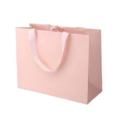 China Modern Wholesale Customized Paper Bag With Logo Printing Paper Bag With Handle for sale