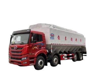 China Bulk feed truck trailer 4 alxes 8x4 24tons poultry tank truck for chicken in farm for sale