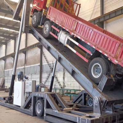 China ISO9001 1T-100T Hydraulic Truck Unloading Platform with Side and Backward Flip for sale