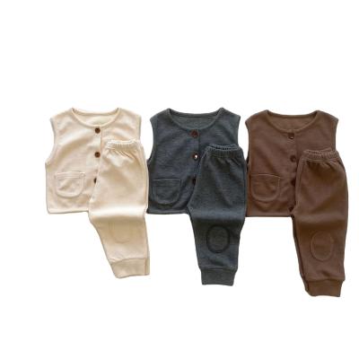 China 2pcs Hot Sale Anti-wrinkle Summer Sleeveless Unisex Newborn Baby Clothes Matching Waffle Kids Clothing Set for sale