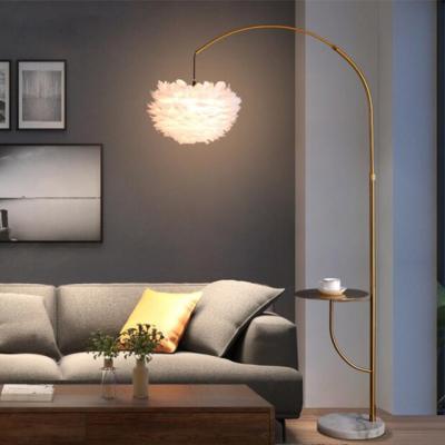 China Gold modern luxury design nordic diy modern metal position light custom made high quality feather feather led floor lamp with table for sale