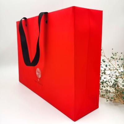 China Recycled Materials Factory Outlet Boutique Tote Bag Paper Bag Shopping Gift Custom Luxury Paper Bag With Ribbon Handle for sale