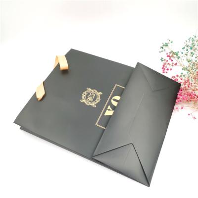 China Factory Recyclable Luxury Shopping Paper Bag Custom Logo Ribbon Handle Gift Bag for sale