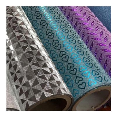 China Moisture Proof Sparkly Cross Line Pattern Bopp Metallized Glitter Film in Soft Finish for sale