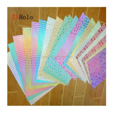 China Multiple Extrusion Yellow Holographic Effect Laminate Film Glitter for Custom Gifts Boxes for sale