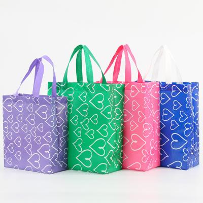 China Durable Factory Customized Love Silk-Printed Solid Color Portable Nonwoven Fabric Bag for sale