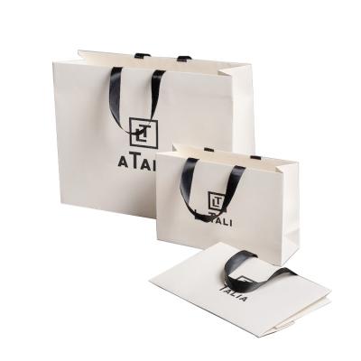 China Recyclable custom printing hi quality gift paper bag eco-friendly white card paper handle shopping bag for sale