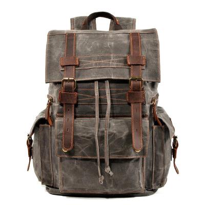 China With USB backpack men's and women's retro oil wax canvas travel computer bag outdoor leisure crazy horse mountaineering leather bag for sale