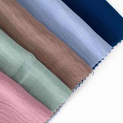 China Sustainable Fabric 100%Polyester Whole Woven Fabric CEY Crepe Fabrics For Garment for sale