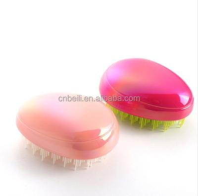 China Custom Salon Logo Home Hair Care Comb Massage Hair Brush Tangle Hair Brush Egg Shaped Detangling Hair Brush for sale