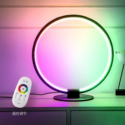 China New-designed Nordic RGB Dimming Modern Colorful Ring Table Lamps Bar Bedroom Desk Lamp Bedside Led Bedside Night Stand Living Room Light Fixtures for sale