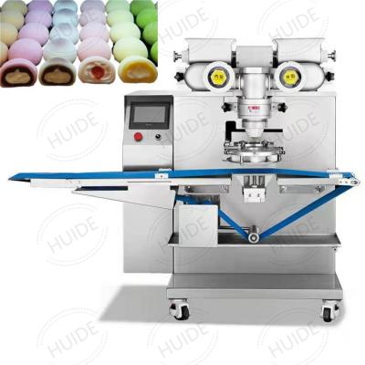 Китай Mochi Making Machine Huide Automatic Mochi Making Machine Filled Encrusting Cake Making Machine Mochi Encrusting Machine продается