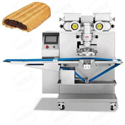 China Automatic Biscuit Machine HUID High Fig Bar Encrusting Machine Biscuit Encrusting Machine Encrust Machine For Sale for sale