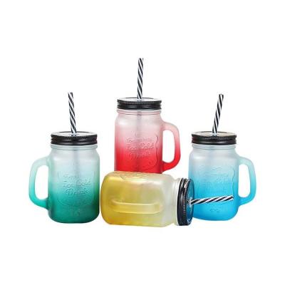 China 500ml eco-friendly recyclable colored glass mason handled jar with metal lid and straw for sale