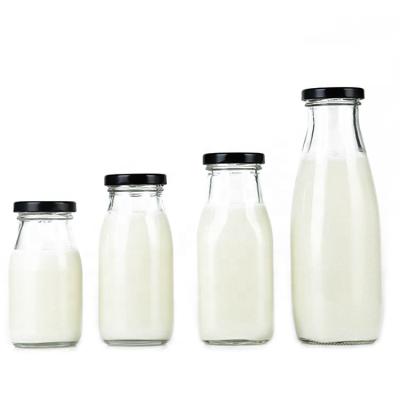 China Beverage 200ml 250ml 300ml 500ml Milk Tea Juice Glass Bottle With Metal Screw Cap for sale