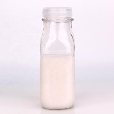 China Square Beverage Factory 360ml 12oz Clear Beverage Milk Tea Glass Bottles With Lid for sale