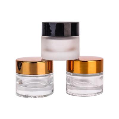 China Hot Sale Recyclable Eco-friendly 10g Round Empty Glass Cream Jar With Black Lid Cosmetic Refillable Empty Glass Container for sale