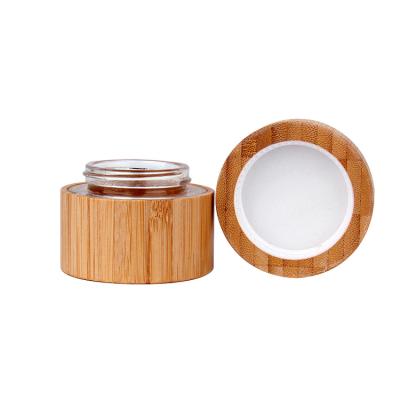 China Environmental friendly natural bamboo jar packaging face cream glass bamboo cosmetic jar with bamboo lid for sale