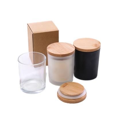 China Wholesale Custom Heat Resistant Frosted Matte Black Clear Glass Candle Vessel Container Jars For Candle Making With Wooden Lid for sale