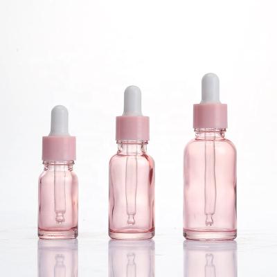 China New Design 10ml 20ml 30ml Pink Color Glass Essential Oil Refillable Dropper Bottle For Serum Essential Oil Dropper Glass Bottle for sale