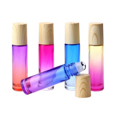 China Personal Skin Care Packaging Glass Roller Bottles Essential Oils Perfume Roll On Bottles 10ml Gradient Color Glass Bottle With Wood Grain Lid for sale