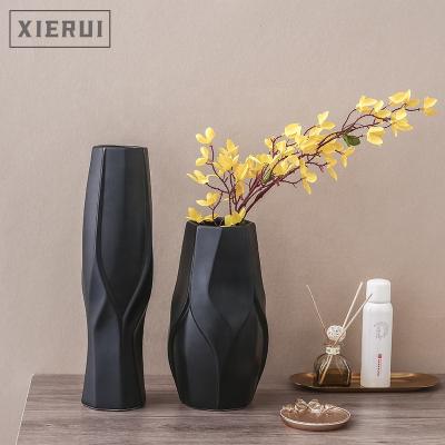 China Nordic Modern Luxury Creative Minimalist Tabletop Black Matte Flower Cream Ceramic Vase For Home Decor for sale