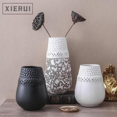 China Nordic Creative Hollow Wedding Flower Vase Modern Minimalist Decorative Luxury Ceramic Vase Tabletop For Home Decor for sale