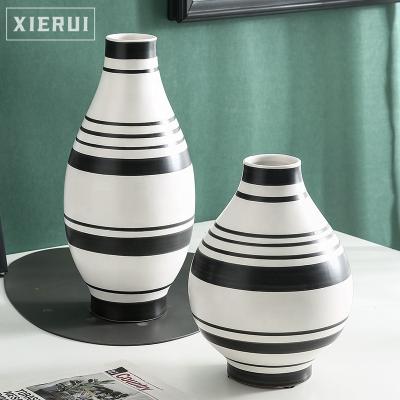 China Modern Minimalist Creative Nordic Flower Vase For Home Decor Simple Luxury Hand Painted Line Ceramic And Porcelain Vase for sale