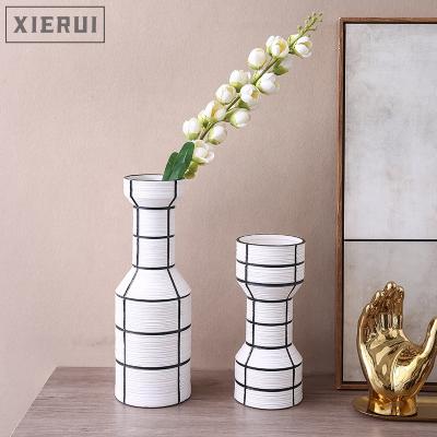 China Minimalist Handmade White Simple Luxury Flower Vase For Modern Nordic Line Craft Home Decor Ceramic Ornament for sale