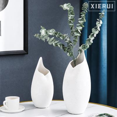 China Nordic simple modern minimalist tabletop creative pointed mouth ornament white ceramic flower vase for home decor for sale